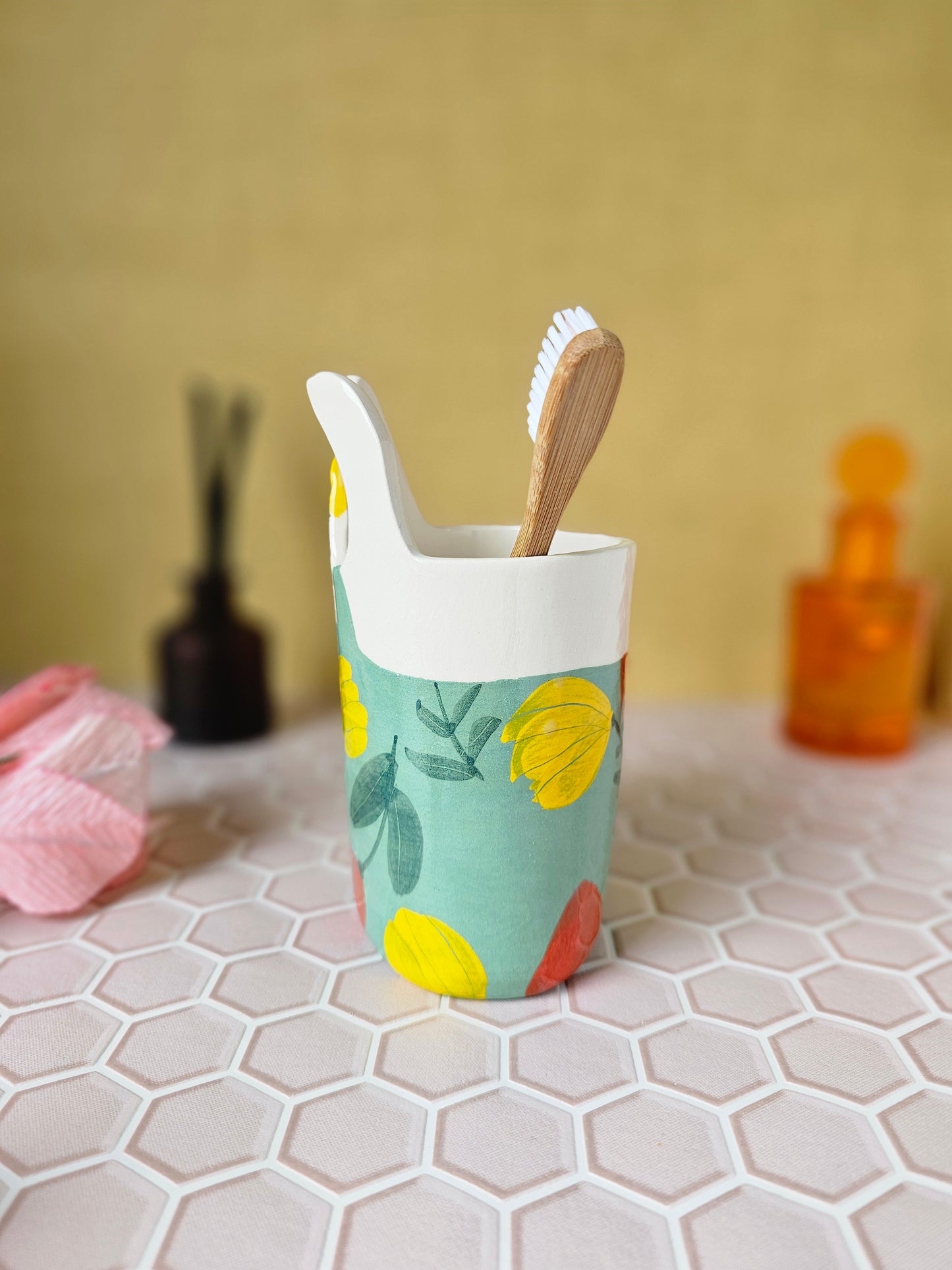 Marigold the swimmer ceramic toothbrush holder