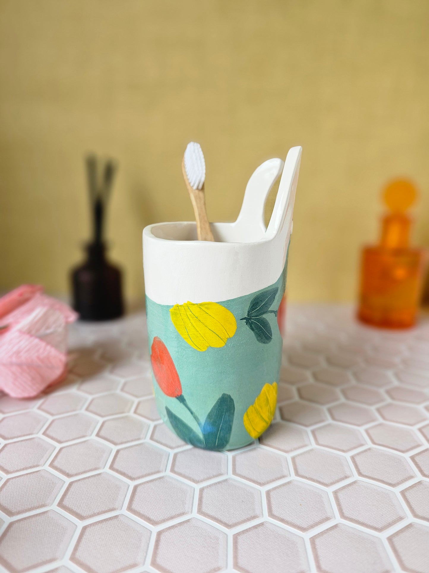 Marigold the swimmer ceramic toothbrush holder