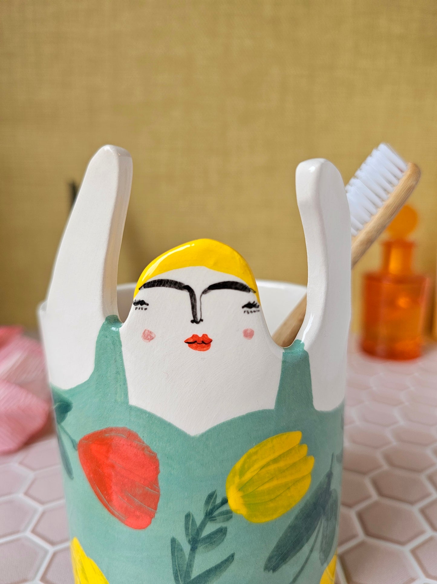 Marigold the swimmer ceramic toothbrush holder