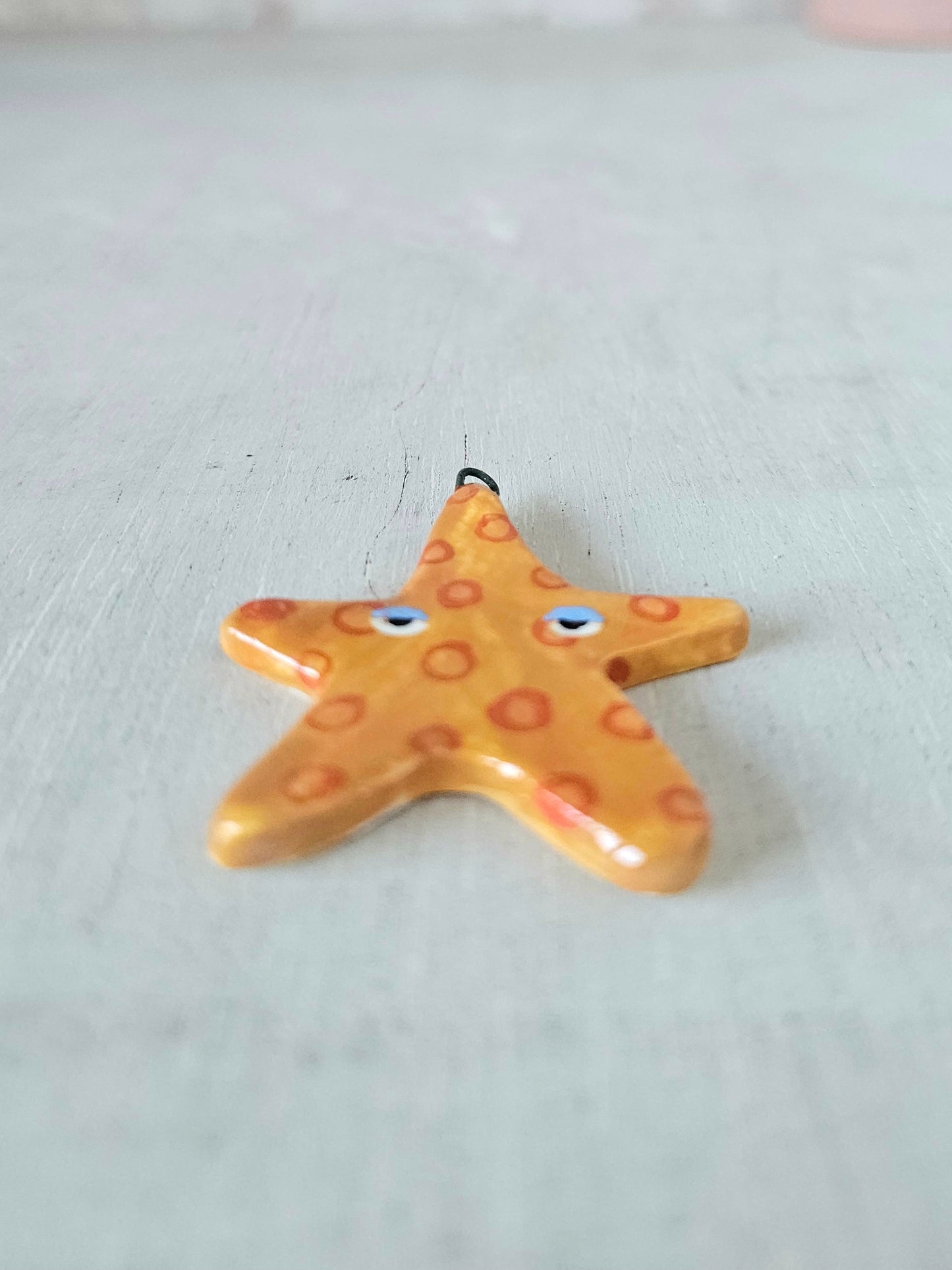 Sassy starfish hand crafted ceramic wall hanging decoration