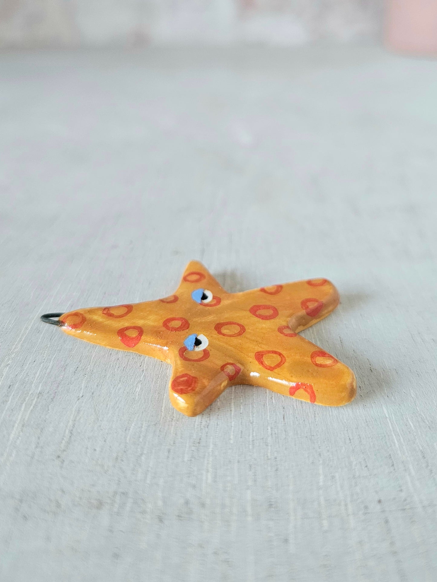 Sassy starfish hand crafted ceramic wall hanging decoration
