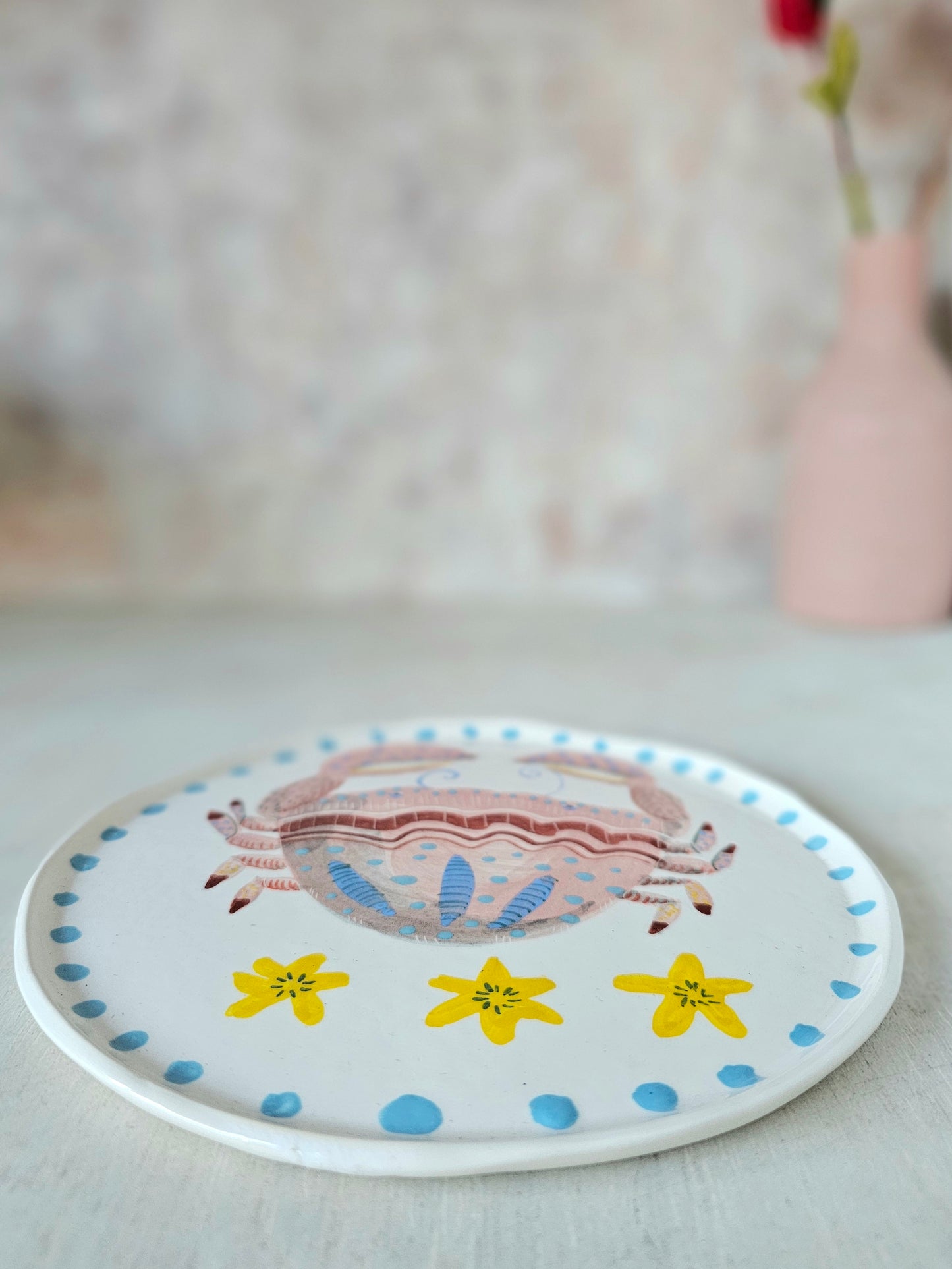 Crabby tonga decorative hand painted ceramic plate .