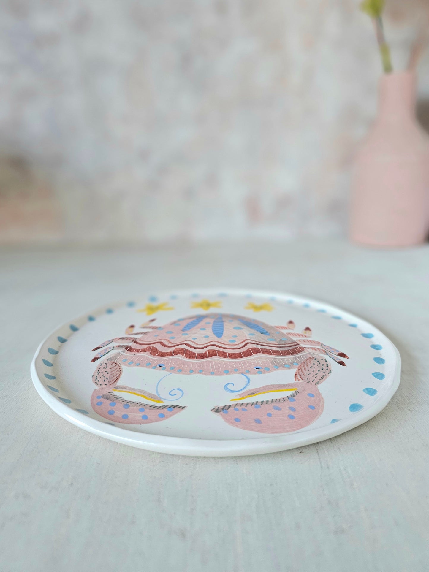 Crabby tonga decorative hand painted ceramic plate .