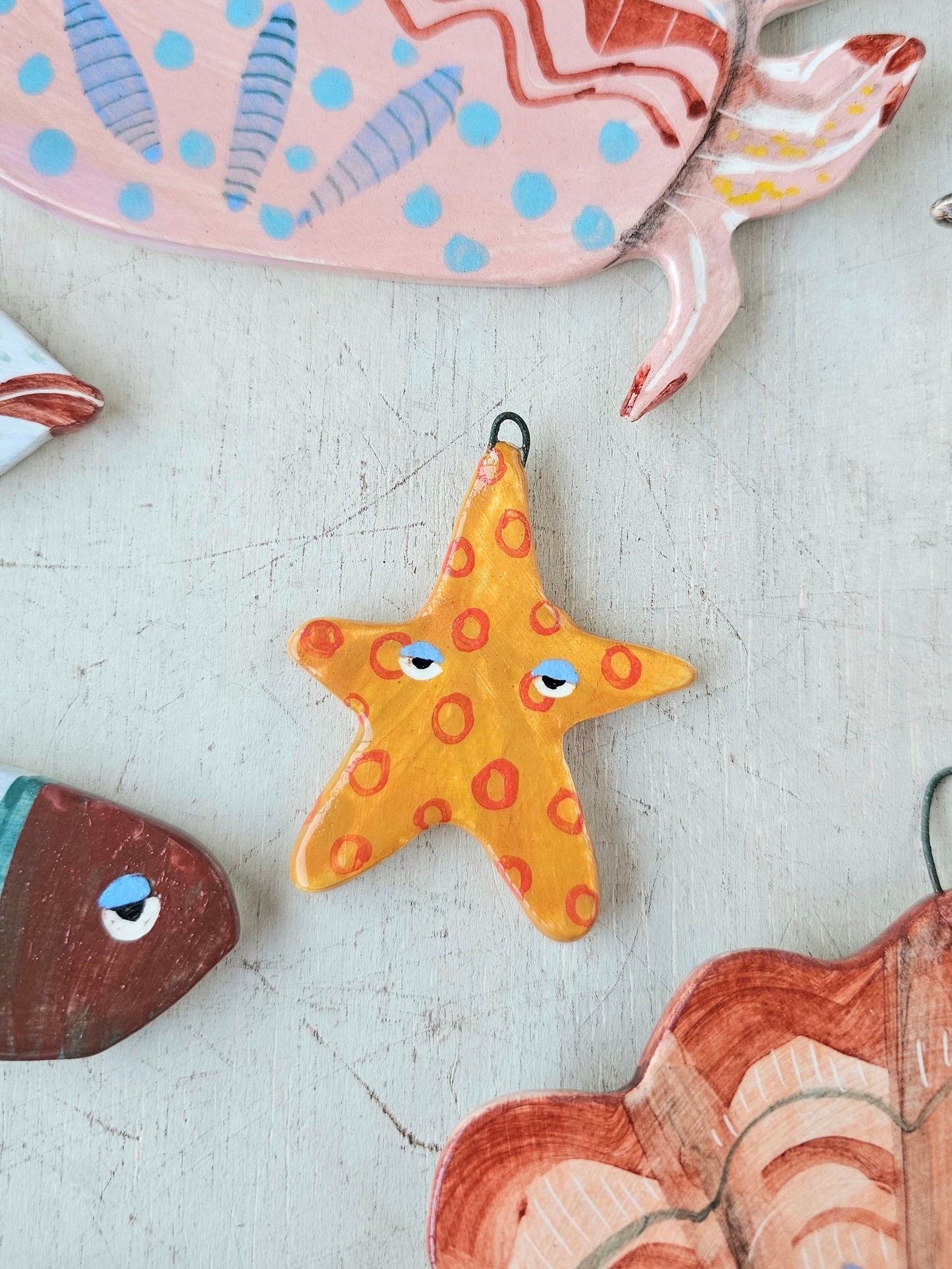 Sassy starfish hand crafted ceramic wall hanging decoration