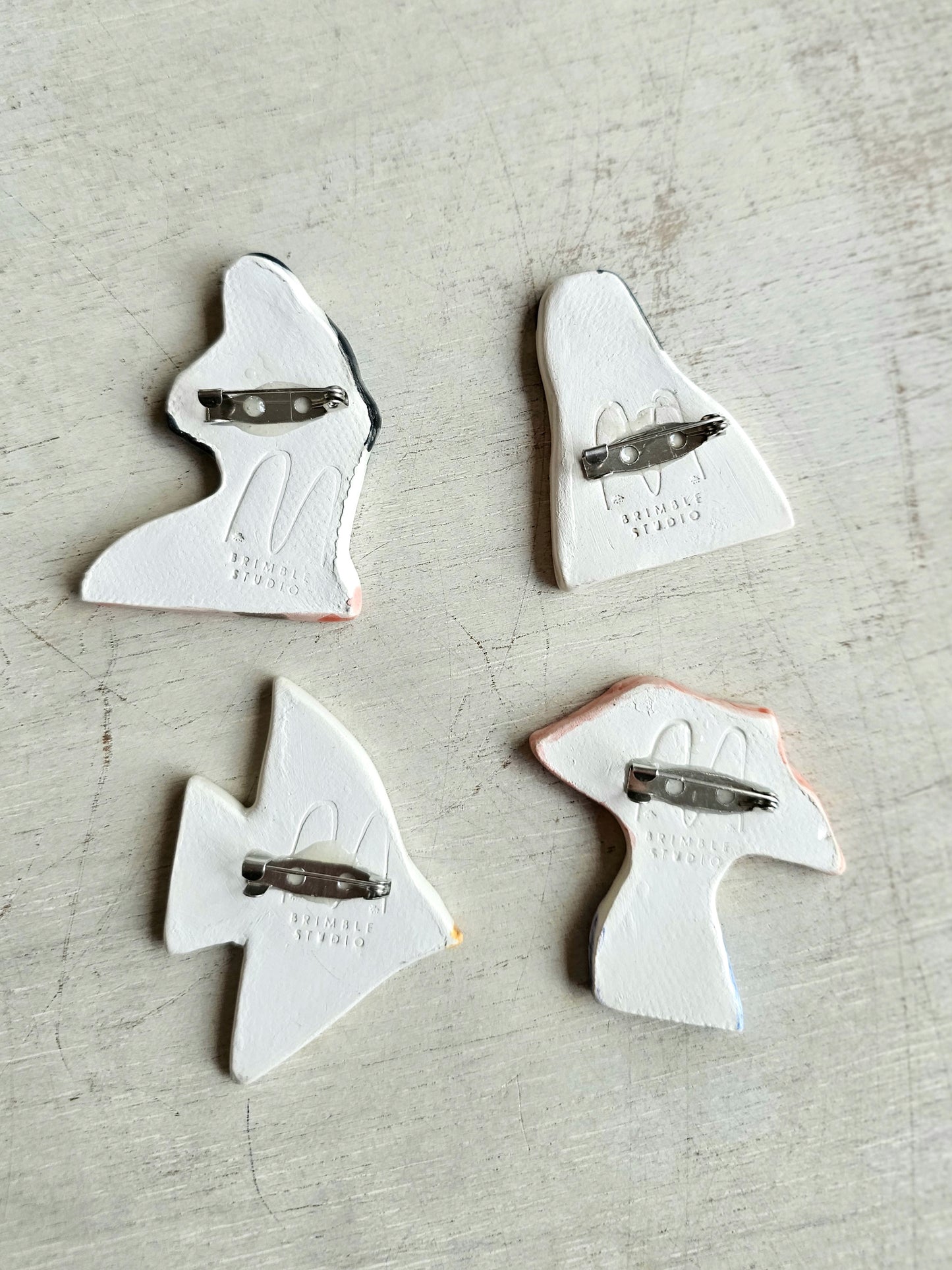 Blue bird handmade ceramic brooch