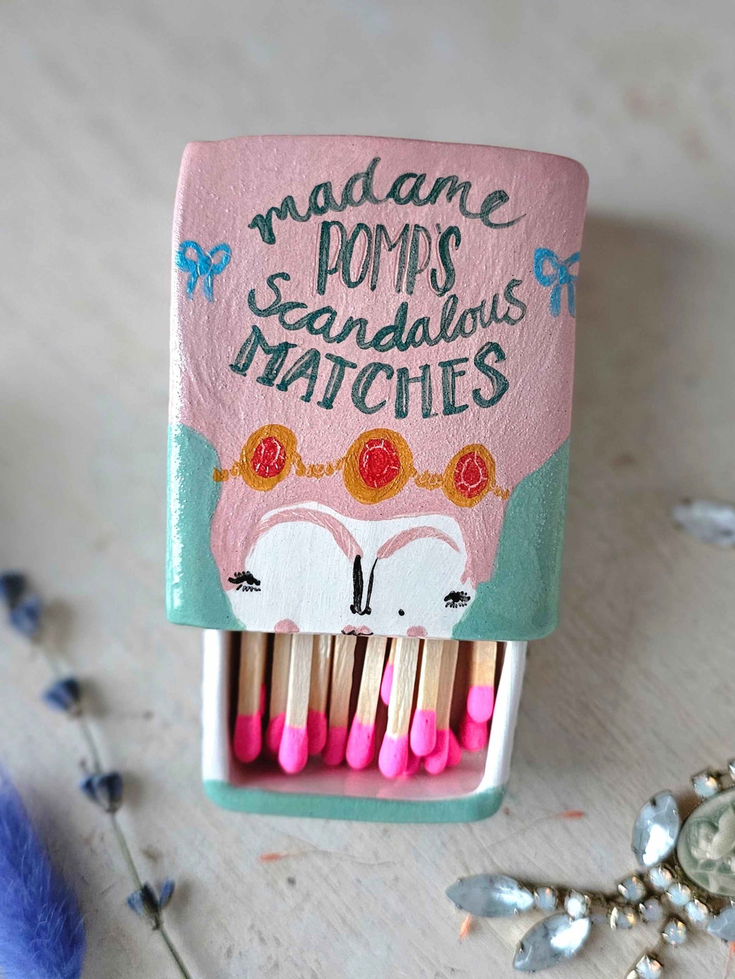 Madame Pomp's Scandalous matches small ceramic matchbox