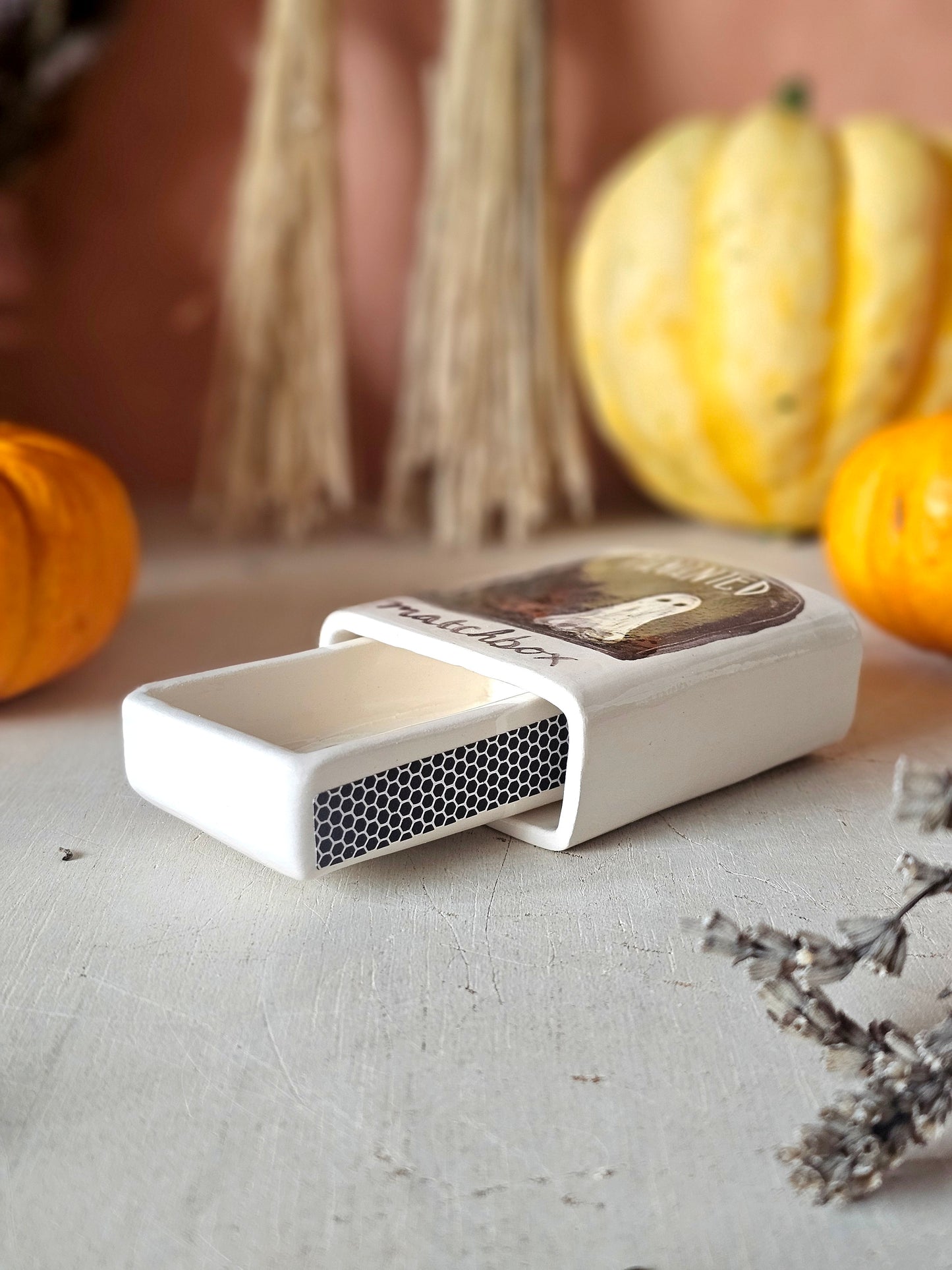 The haunted small ceramic matchbox with mini ghost