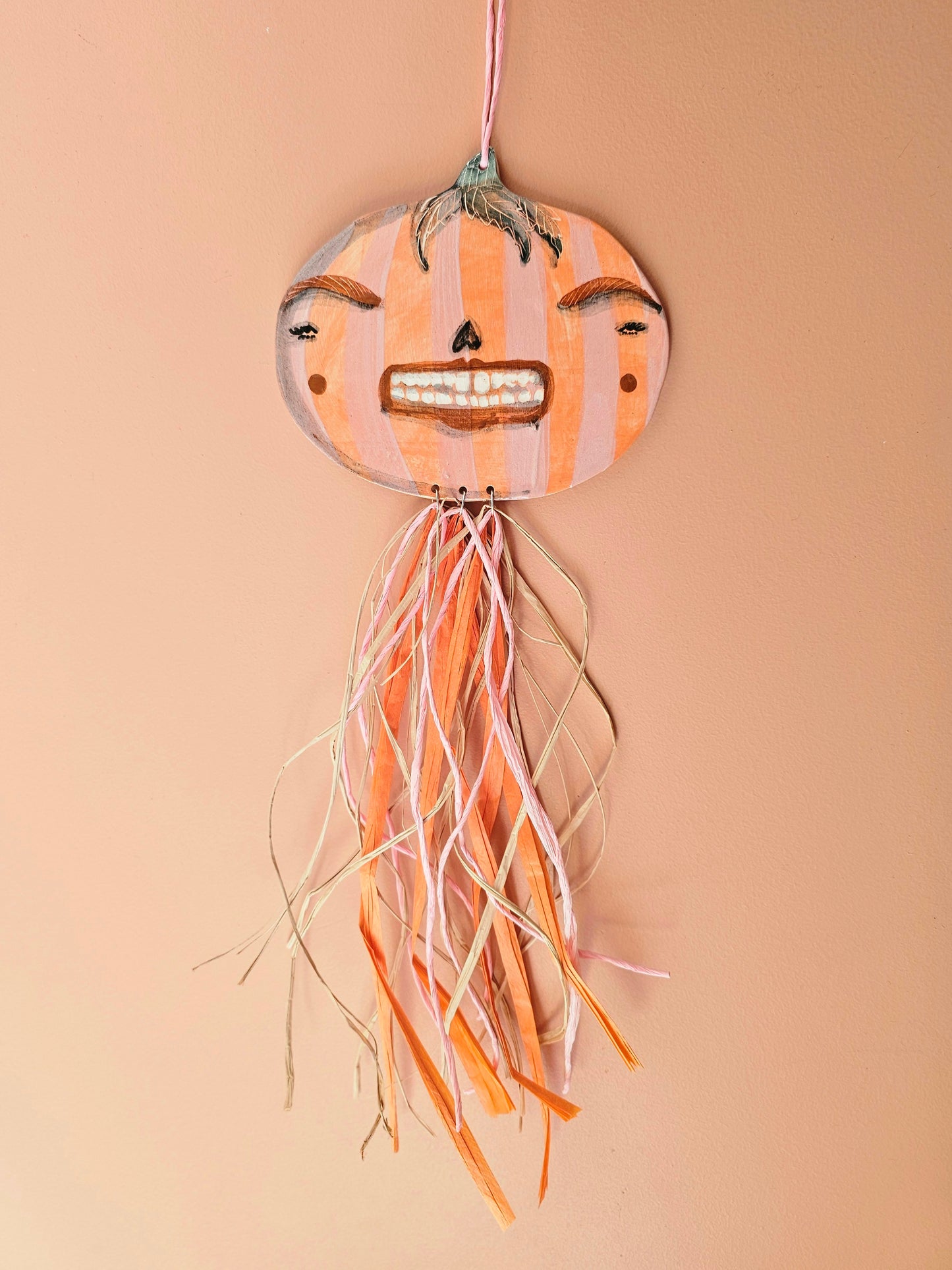 Grinny Ginnie – Female Pumpkin Head with Straw Décor