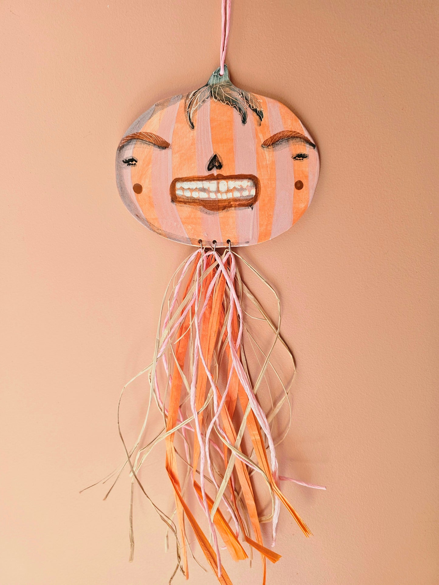 Grinny Ginnie – Female Pumpkin Head with Straw Décor