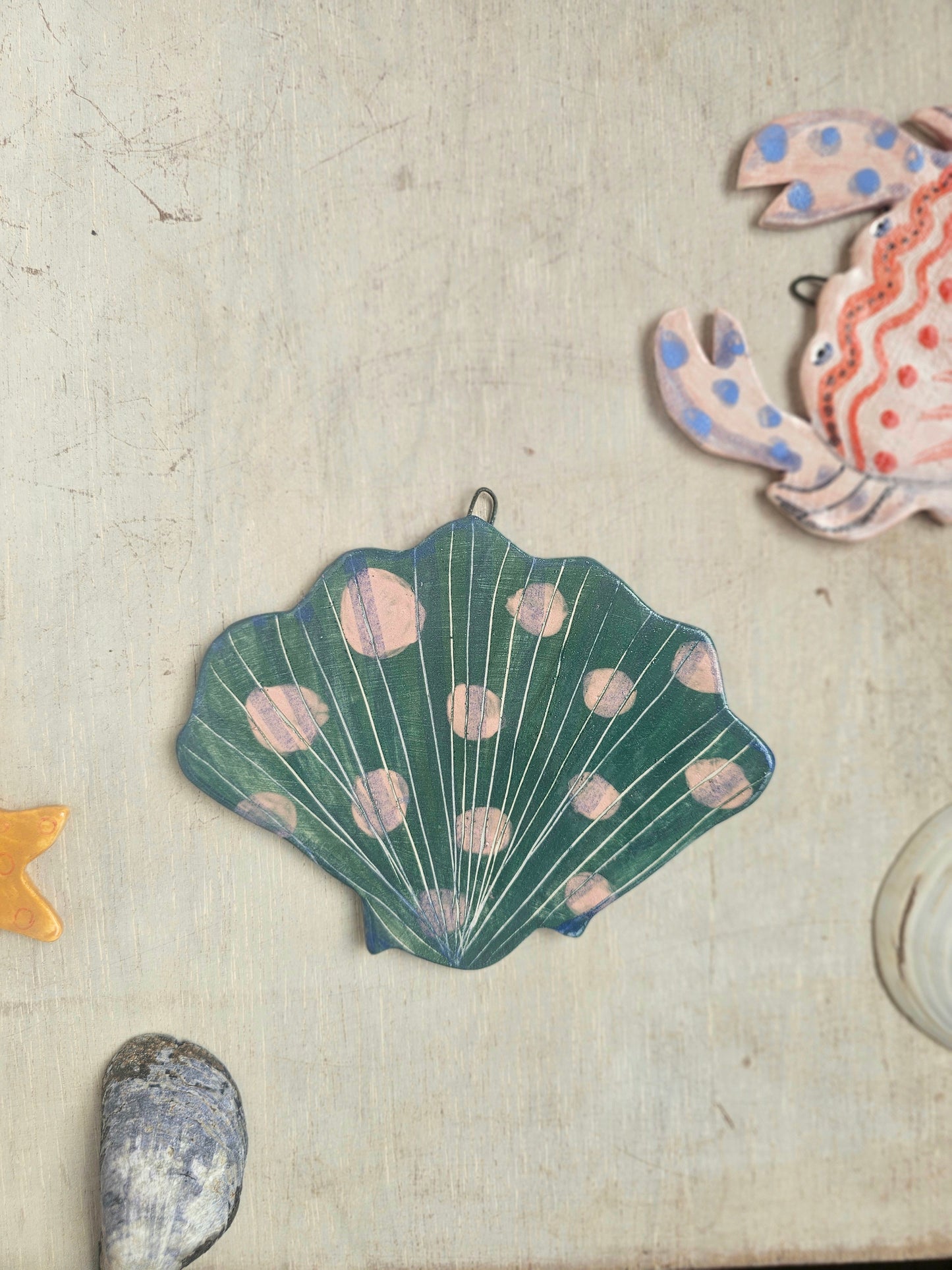Shelley shell handcrafted ceramic wall hanging decoration green