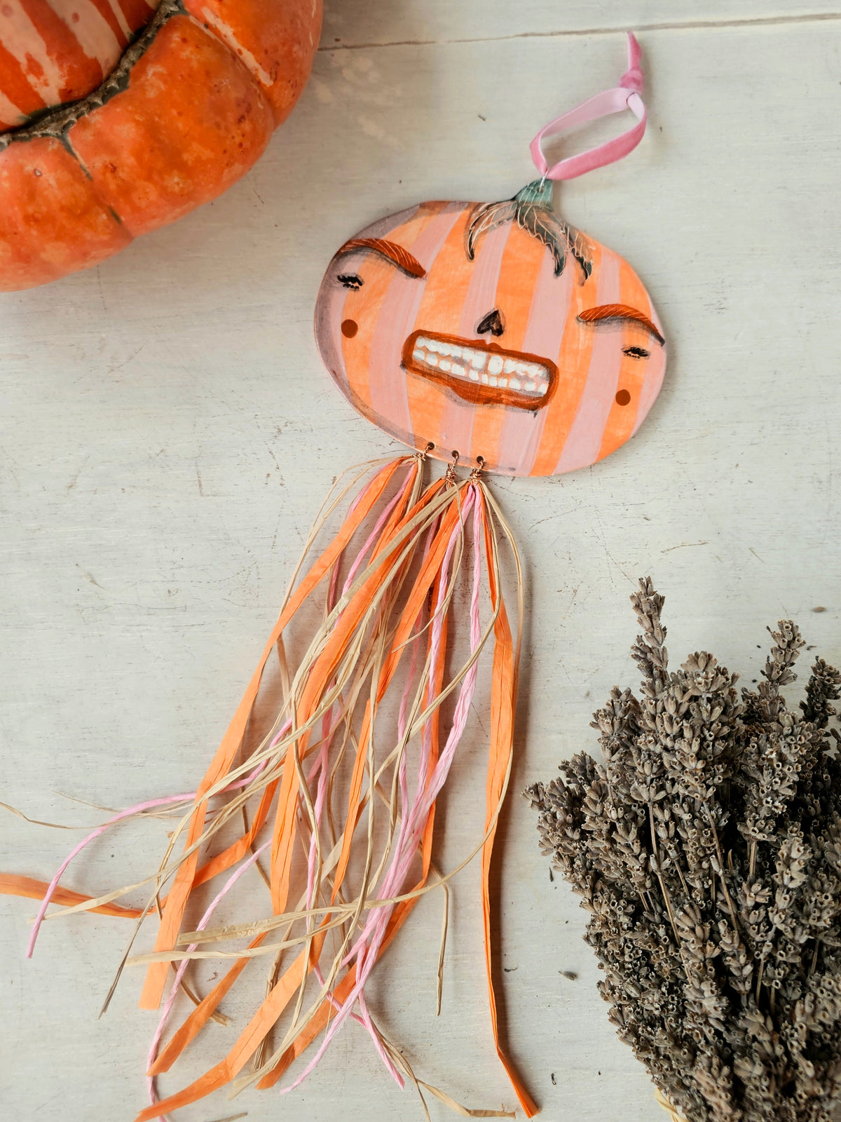 Grinny Ginnie – Female Pumpkin Head with Straw Décor