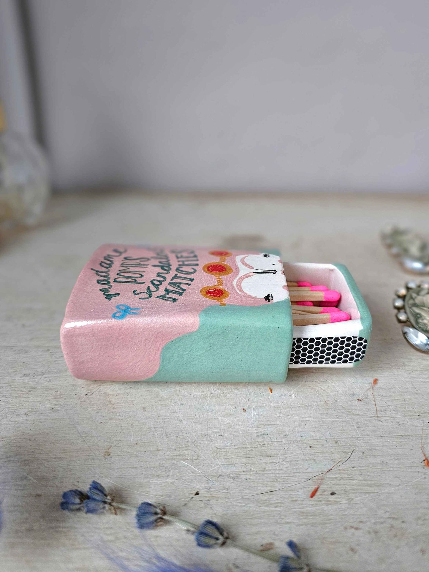 Madame Pomp's Scandalous matches small ceramic matchbox