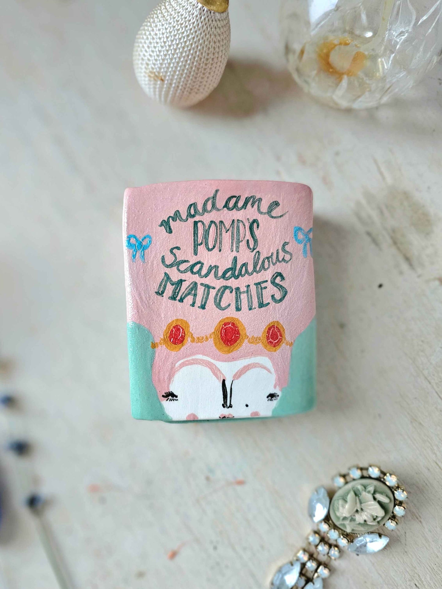 Madame Pomp's Scandalous matches small ceramic matchbox