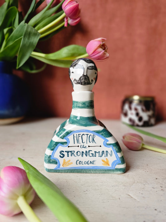 Hector the Strongman cologne Bottle