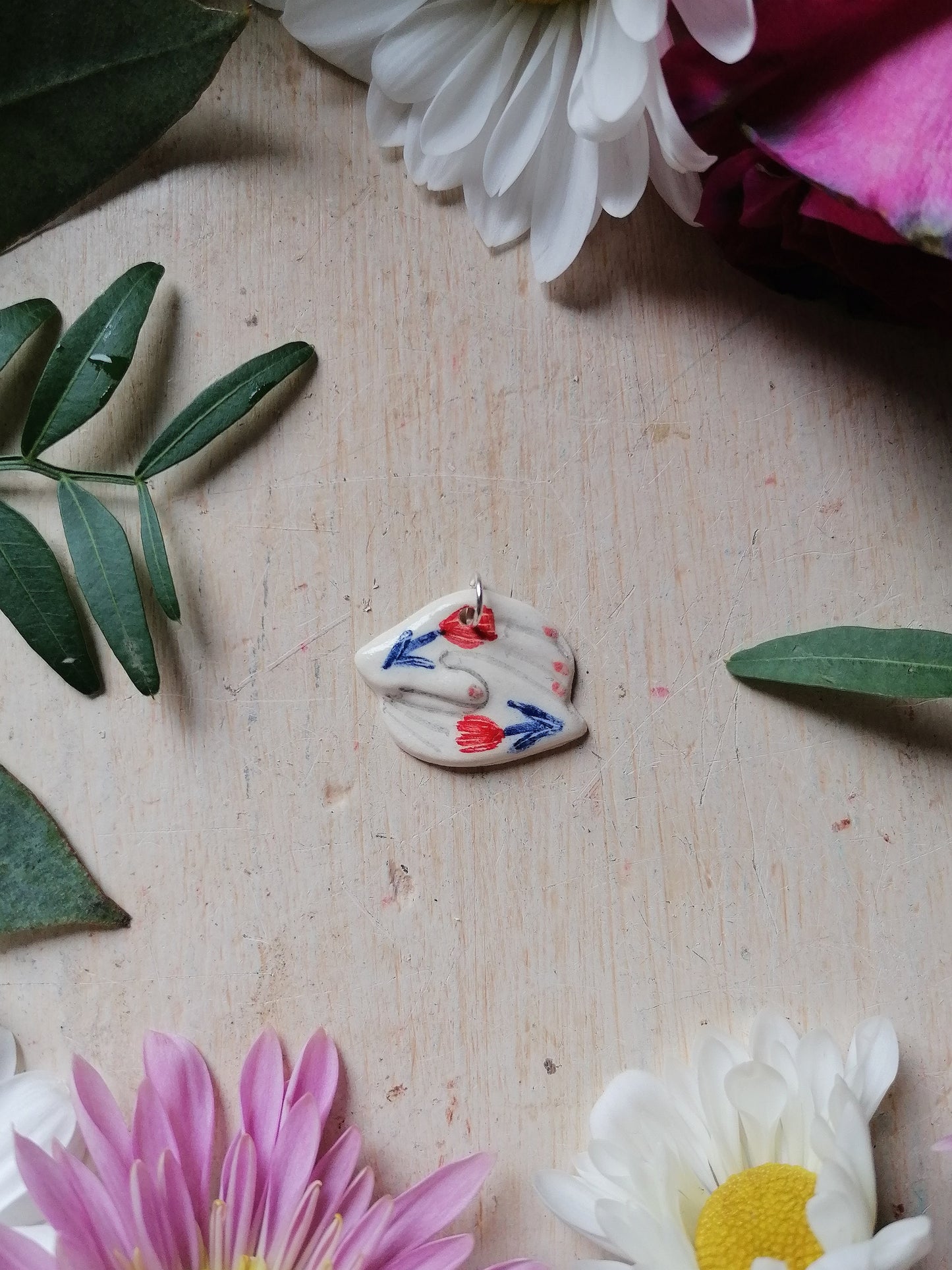 Holding hands card with ceramic pendant